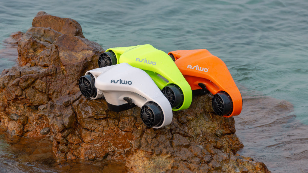 three underwater scooters three underwater scooters